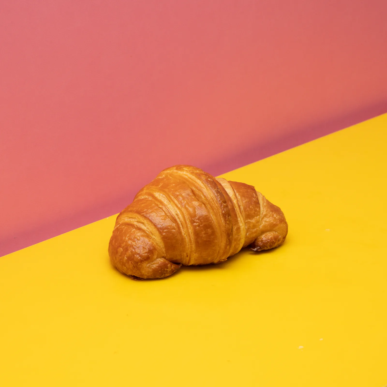 SDHK Cornetto — A buttery Italian cornetto baked for that soft, flaky pull-apart moment. Classic, elegant, and perfect just like you. Dangerously easy to justify with coffee.