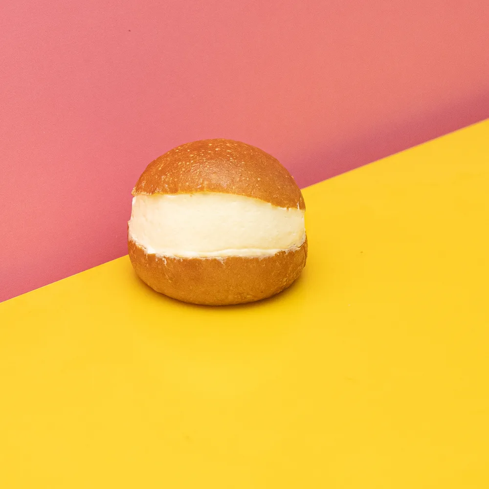 SDHK Maritozzo alla Panna — A soft Italian bun filled with fresh whipped cream and finished with Sugar Daddy attitude. Light, indulgent, and just dramatic enough.